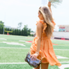 GAMEDAY_07-21-26_LM_11439_219908_abb7c42e-d215-49ef-be56-21dfdfab7f93.png It's My Day Orange Smocked Top Mini Dress